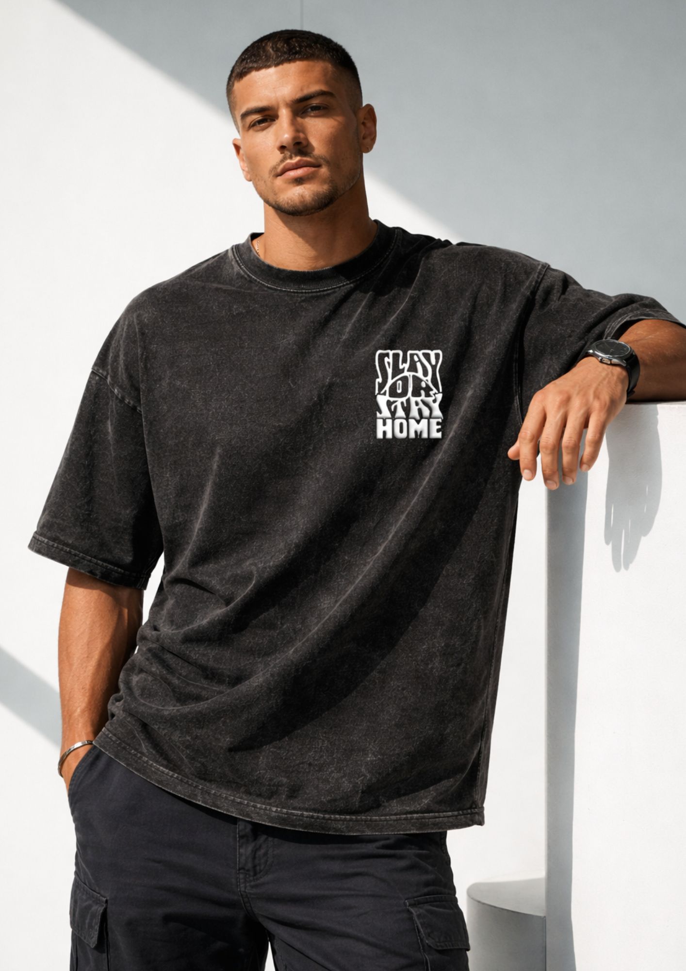 black acid wash unisex tshirt with slay or stay home puff print graphic oversized 240 gsm cotton streetwear worn by male and female models