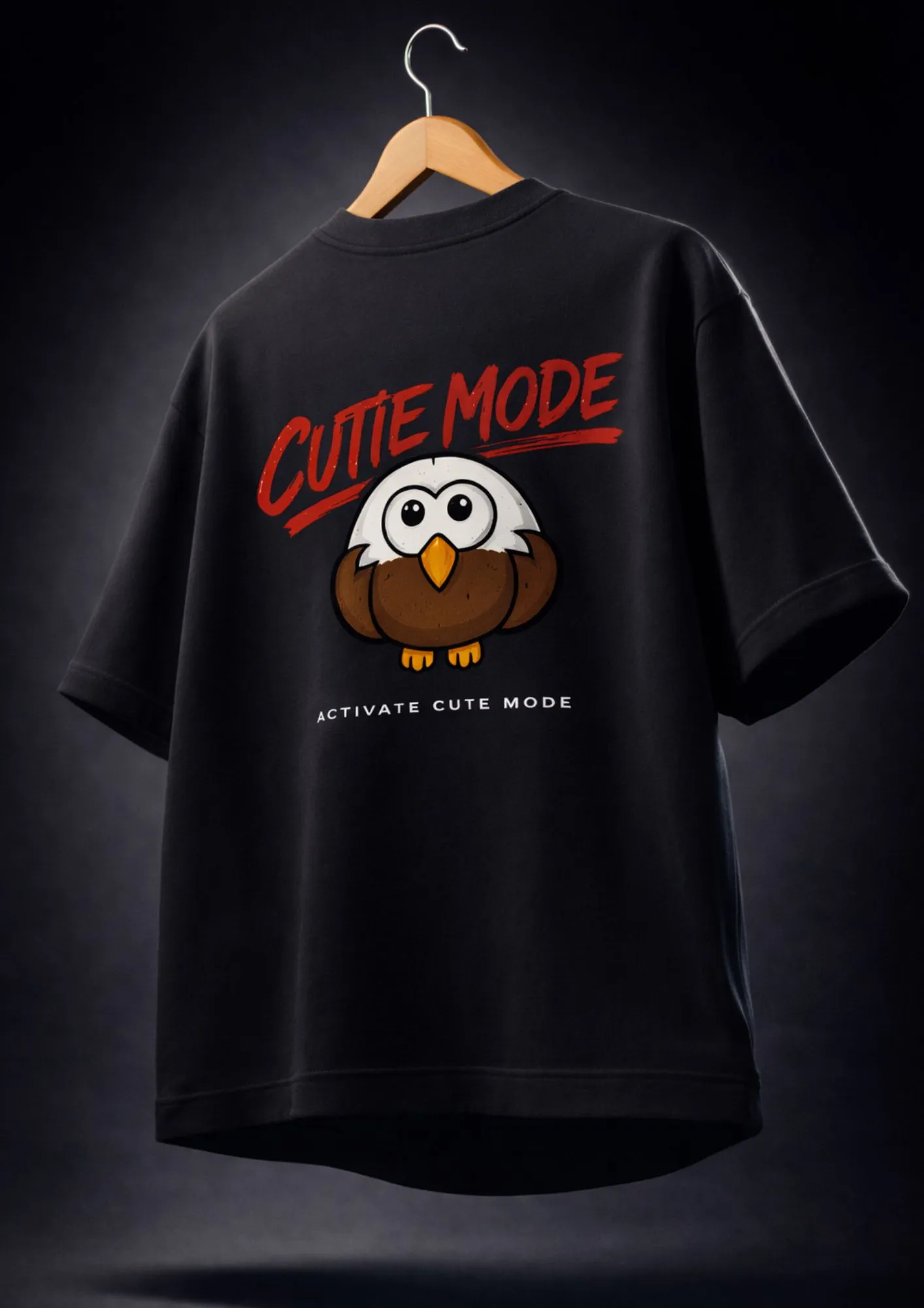 Black oversized t-shirt with Hello Cutie text on front and Cutie Mode cartoon graphic print on back