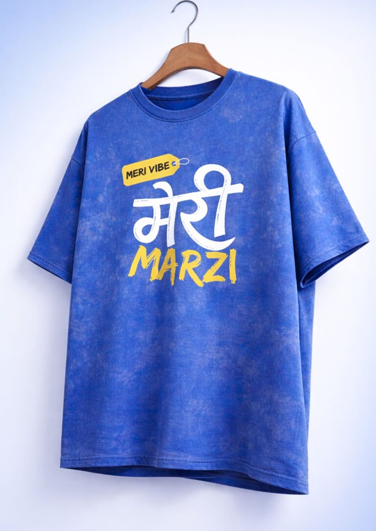 Unisex royal blue acid wash oversized t-shirt with bold "Meri Marzi" Hindi-English graphic print in white and yellow, 240gsm heavyweight cotton, desi streetwear style